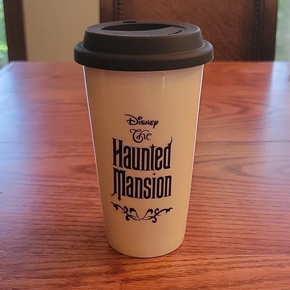 DISNEY The Haunted Mansion 20 oz. ceramic coffee tea mug cup. With lid.